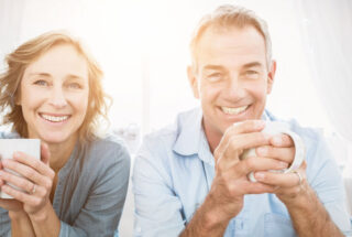 Couple drinking coffee after individual therapy for addiction.