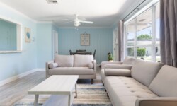 Inviting and modern living room with light blue walls