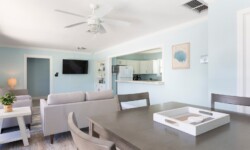 Bright living area with light gray couches