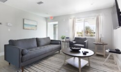 Contemporary living space with a gray sectional sofa