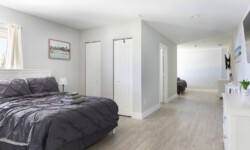 Spacious bedroom with a comfortable bed