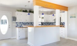 Modern kitchen with blue tile backsplash